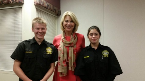 Nick Williams (Left) and Maria Rangel (Right)
stand with mayor Jean Stothert at the OCCP
Banquet. The two explorers helped set up and
serve food to the citizen patrollers.
Photo by Maddie McGrath
