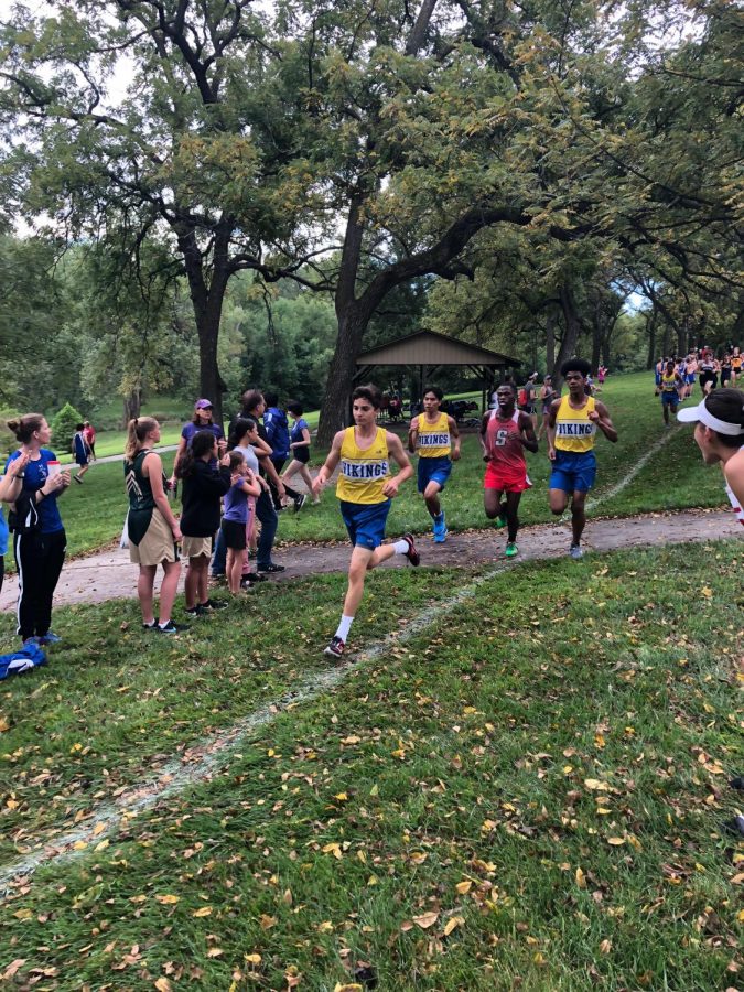 Damian Frausto runs in front of teammates and an Omaha South opponent. “Hard work will take me where ever I want to go,” Frausto said.
Photo courtesy of Damian Frausto