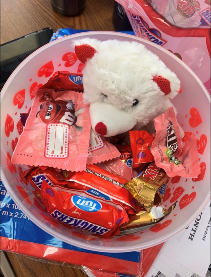 This is an example of a $12 basket order for Valentine’s Day. This version contained candy, a brownie, a teddy bear, and more. 
Photo courtesy of BSLC