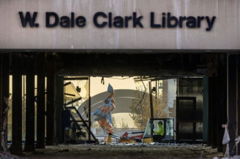 W. Dale Clark Library sits with glass shattered on October 20, 2022. Demolition began early October 2022. 
PHOTO BY CHRIS MACHIAN