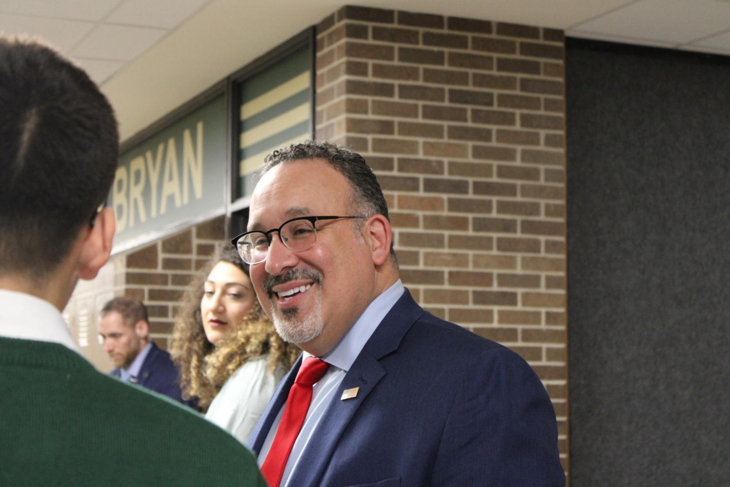 United States Secretary of Education, Miguel Cardona, smiles as he tours Omaha Bryan High school on February 8. Cardona visited the school in pursuit of learning more about their College & Career Academies and Pathways. 
PHOTO BY VIVIAN LANDIS