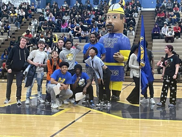 The North bowling team stands with Vik the Viking to be recognized during the 2024 spring pep rally.
PHOTO BY ELIZABETH ANDERSON